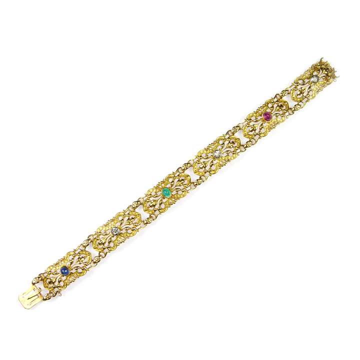 Late 19th century gold and gem set panel bracelet